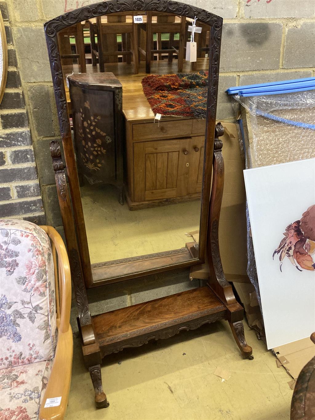 A Victorian carved flame mahogany cheval mirror, width 80cm, height 168cm